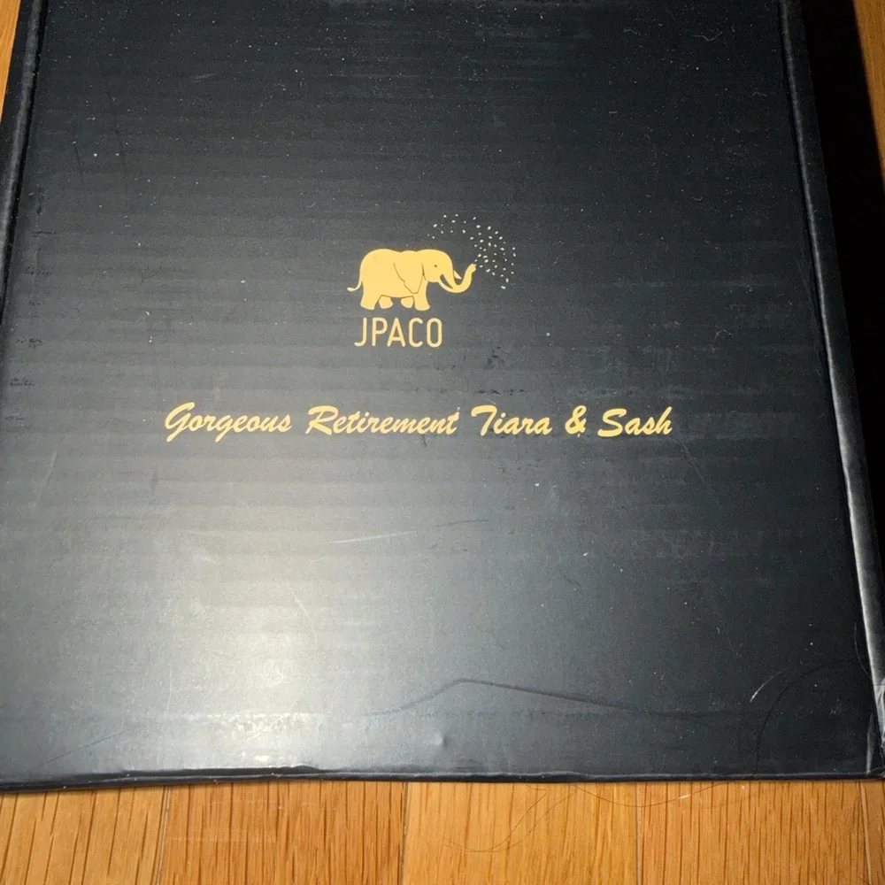 Retirement pink tiara and sash, includes box. Both are one size fits all. NWT